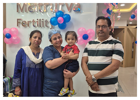Happy family with newborn at the clinic
